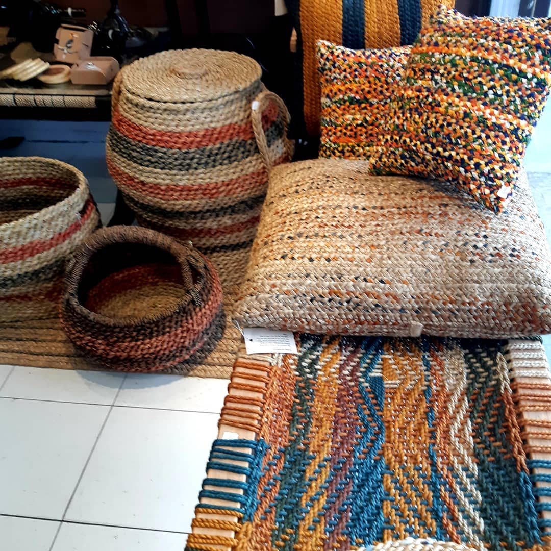 Handwoven baskets, cushions and textiles on display